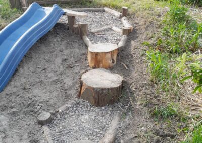 zandbak glijbaan en klimelementen